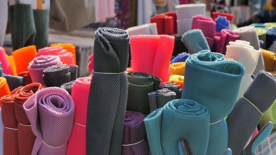 colorful fabric rolls Marché Saint-Pierre Paris textile market
