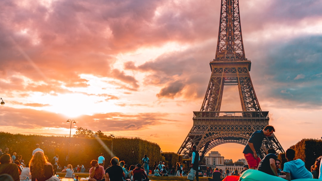 group playing mobile games at Eiffel Tower park