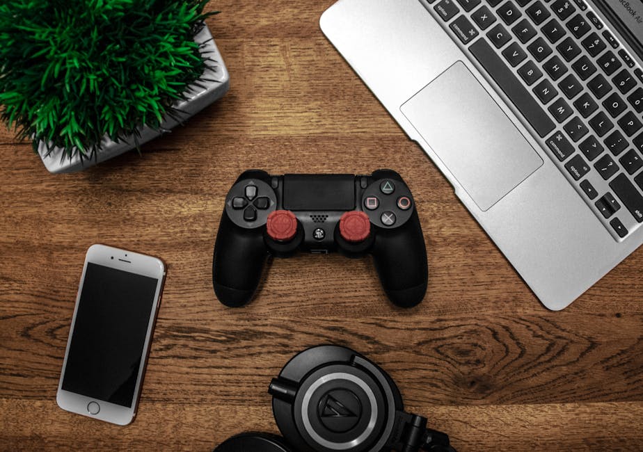 smartphone gaming setup with controller cafe table