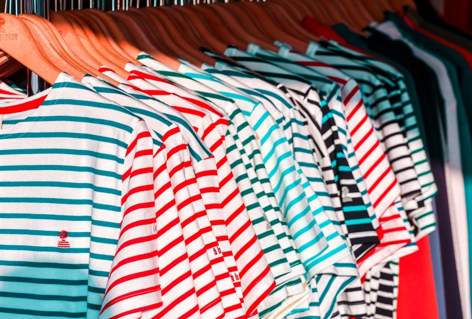 Striped Breton shirt on clothing rack Paris boutique